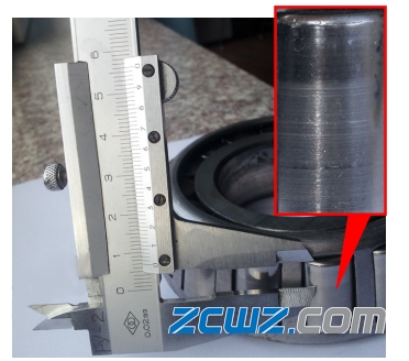 圓錐滾子軸承滾道破損和貫穿裂紋故障分析