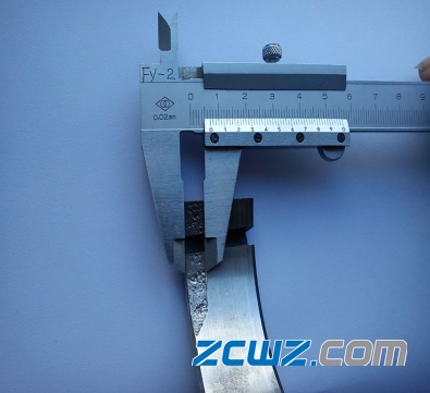 圓錐滾子軸承滾道破損和貫穿裂紋故障分析