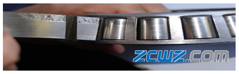 圓錐滾子軸承滾道破損和貫穿裂紋故障分析